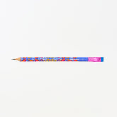 A colorful wooden pencil with a blue body, vibrant multicolor floral pattern, a pink ferrule, and a blue eraser shown horizontally against a plain white background.