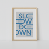 Slow Down graphic in picture frame
