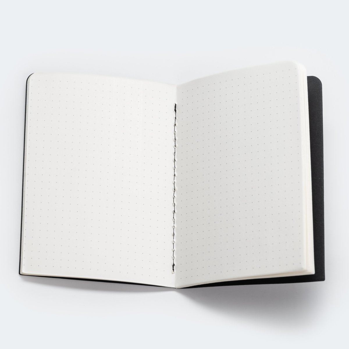 black A6 memo book with dot-grid paper