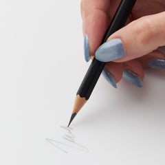 hand writing with Blackwing matte pencil on paper