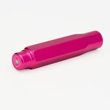 A metallic magenta pink pencil point guard featuring a white stylized flower logo, shown on a clean white background.