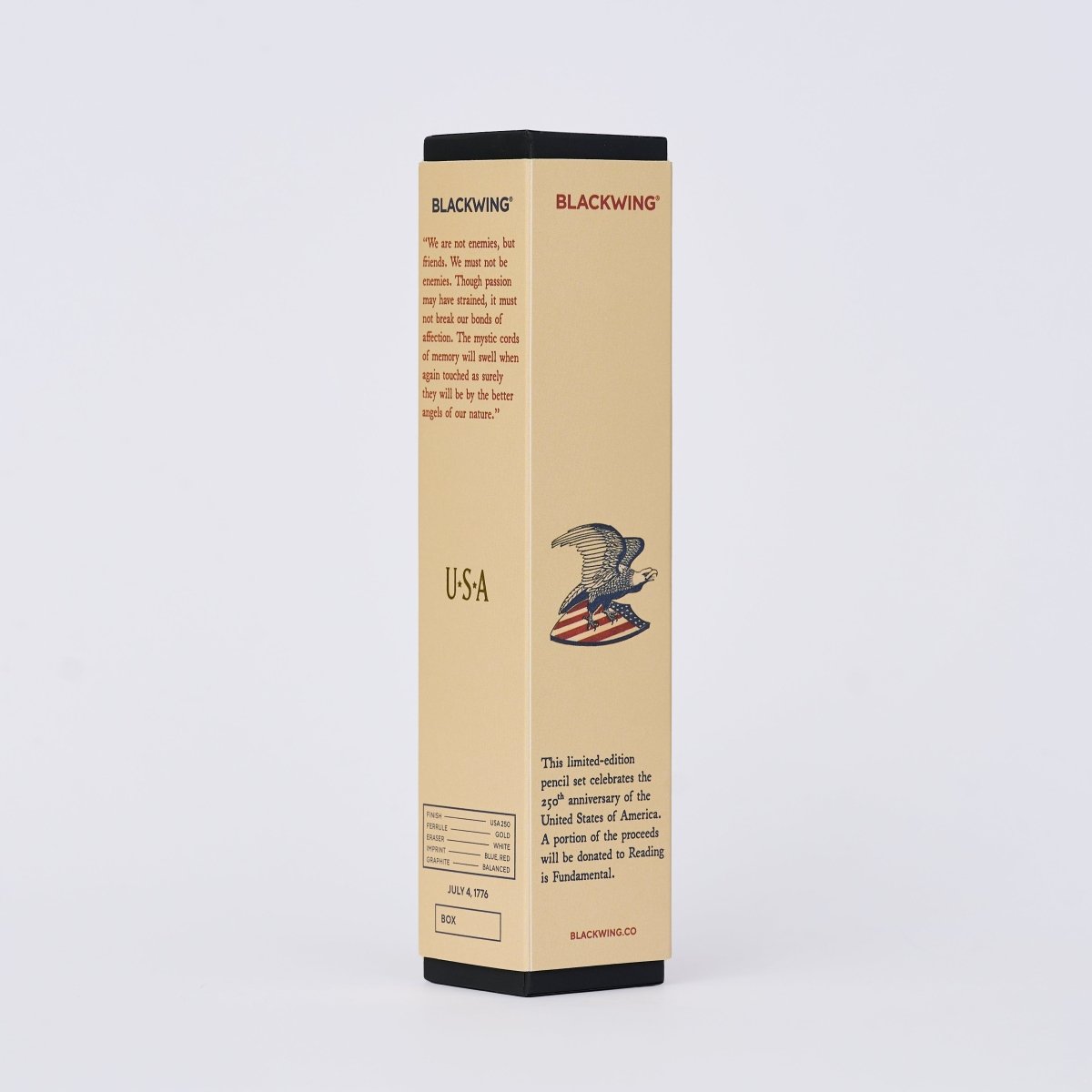 Blackwing pencil box in light tan color with eagle printed on side and quote from Abraham Lincoln