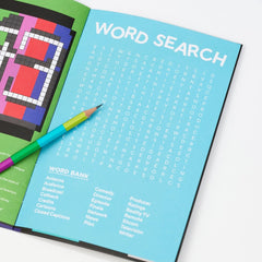 Colorful word search book with a pencil on a white background