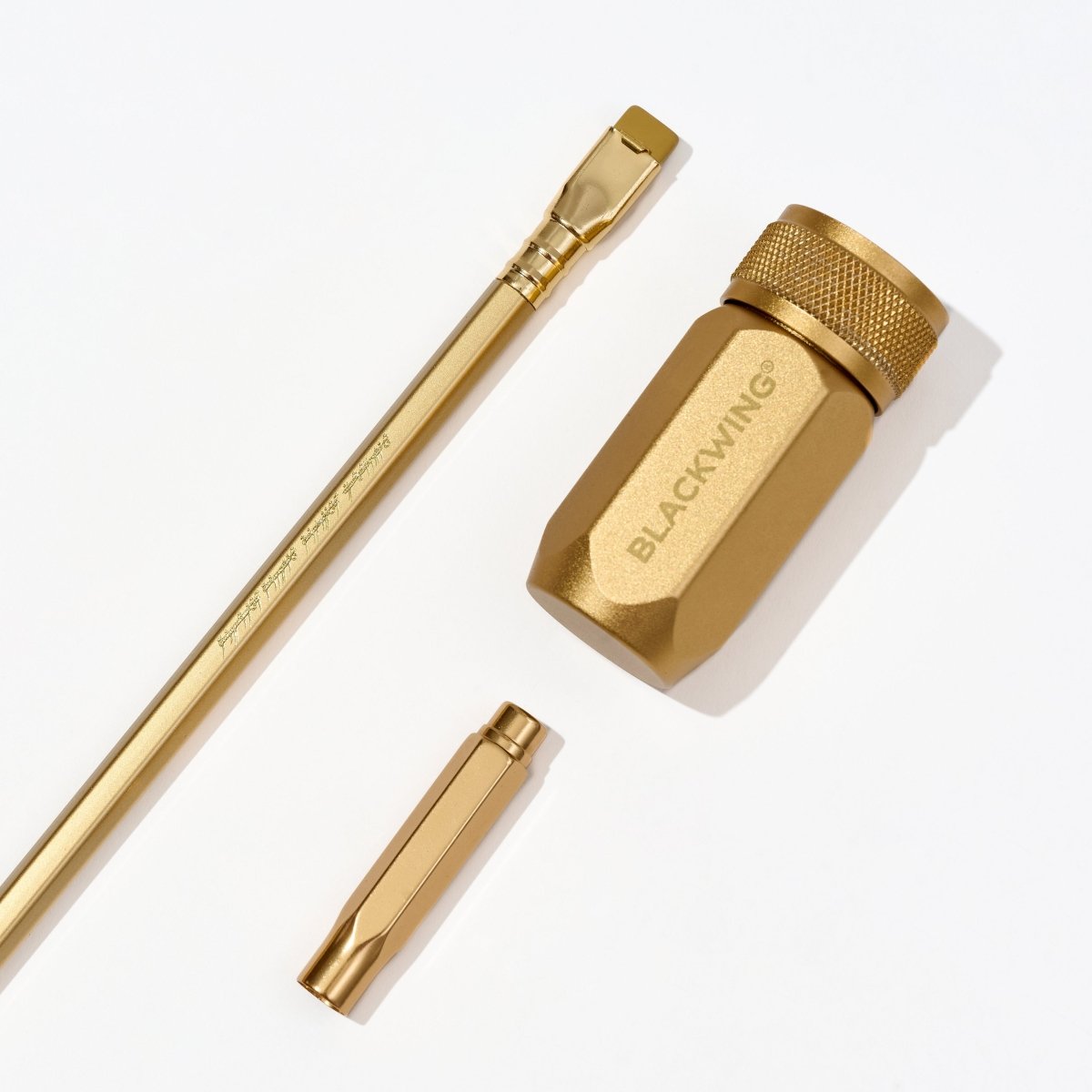 Blackwing Lord of the Rings gold pencil, sharpener, and point guard