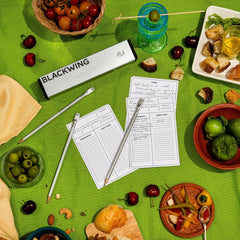 Blackwing Volume 140 pencils and recipe cards on a green tablecloth