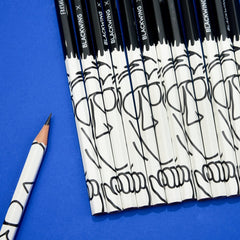 Blackwing pencils with "Freshly Squeezed" Orange Cassidy design on a blue background