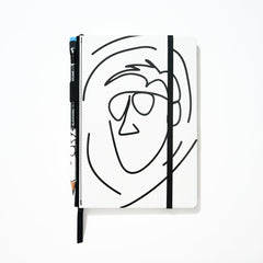 Blackwing x AEW "Freshly Squeezed" Orange Cassidy Notebook with a minimalist black line drawing of a face on a white cover