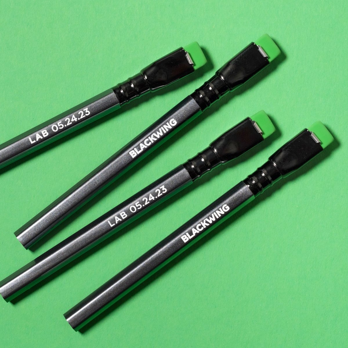 Four Blackwing Lab 05.24.23 pencils in dark shiny grey