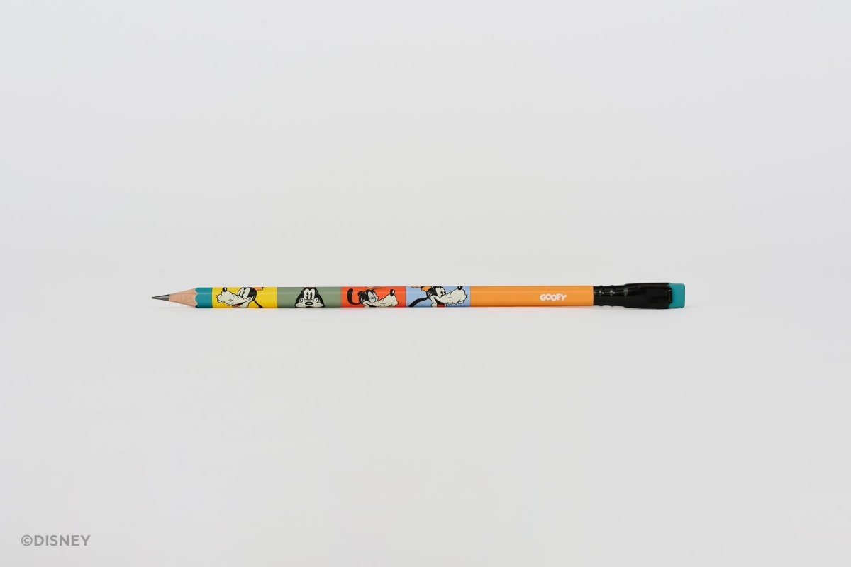 A Blackwing Disney pencil with a colorful cartoon pattern of Goofy on an orange barrel, featuring a black ferrule and a blue eraser, set against a plain light gray background.