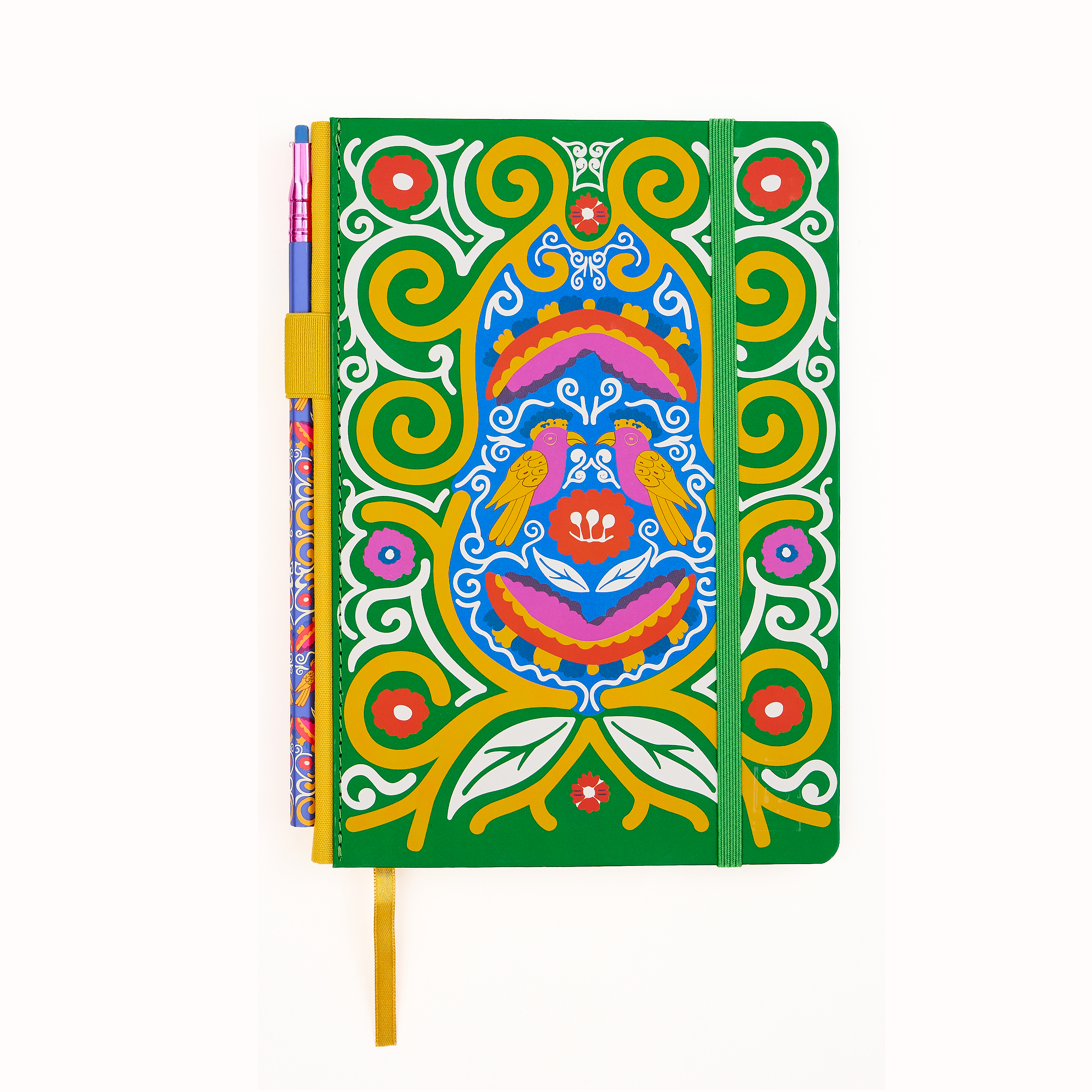 A hardcover notebook with a vibrant green cover decorated with a colorful Frida Kahlo spiral, bird, and floral illustration, featuring a green elastic closure band and a yellow bookmark ribbon with a matching pencil in the pencil holster.