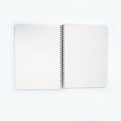 Blackwing A4 Spiral Notebook with ruled pages laying open on a white background
