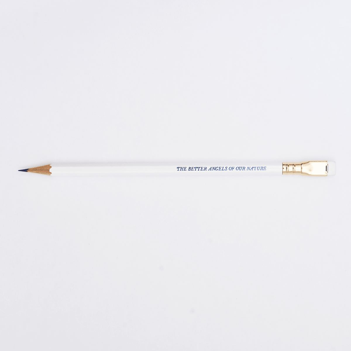 white pencil with imprint 'THE BETTER ANGELS OF OUR NATURE' on a white background