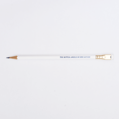 white pencil sharpened on a white background with pencil barrel text in blue that says 'THE BETTER ANGELS OF OUR NATURE'.