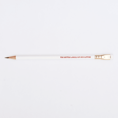 white pencil sharpened on a white background with pencil barrel text in red that says 'THE BETTER ANGELS OF OUR NATURE'.
