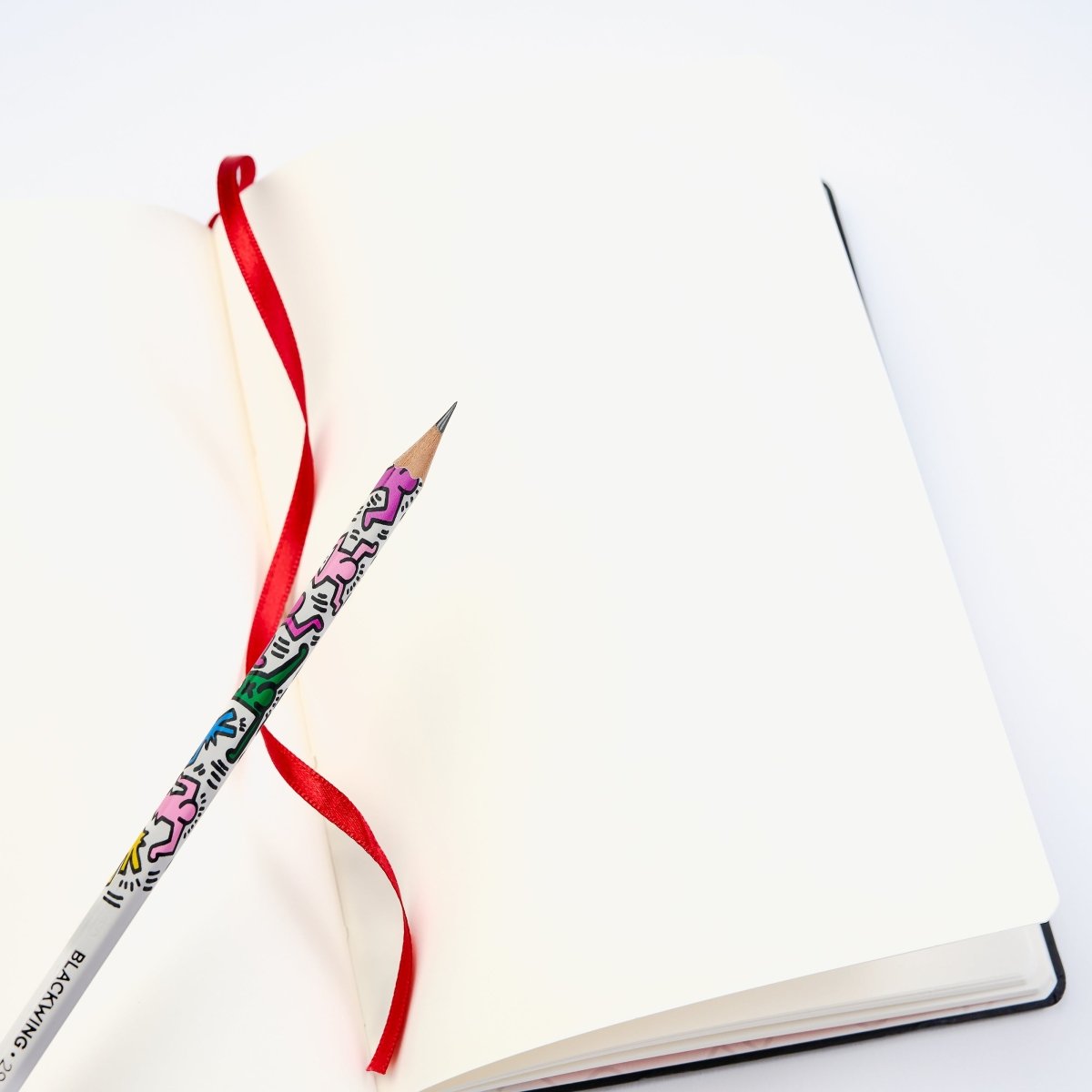 Blackwing Volume 292 Keith Haring Notebook laying open on a white background