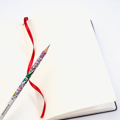 Blackwing Volume 292 Keith Haring Notebook laying open on a white background