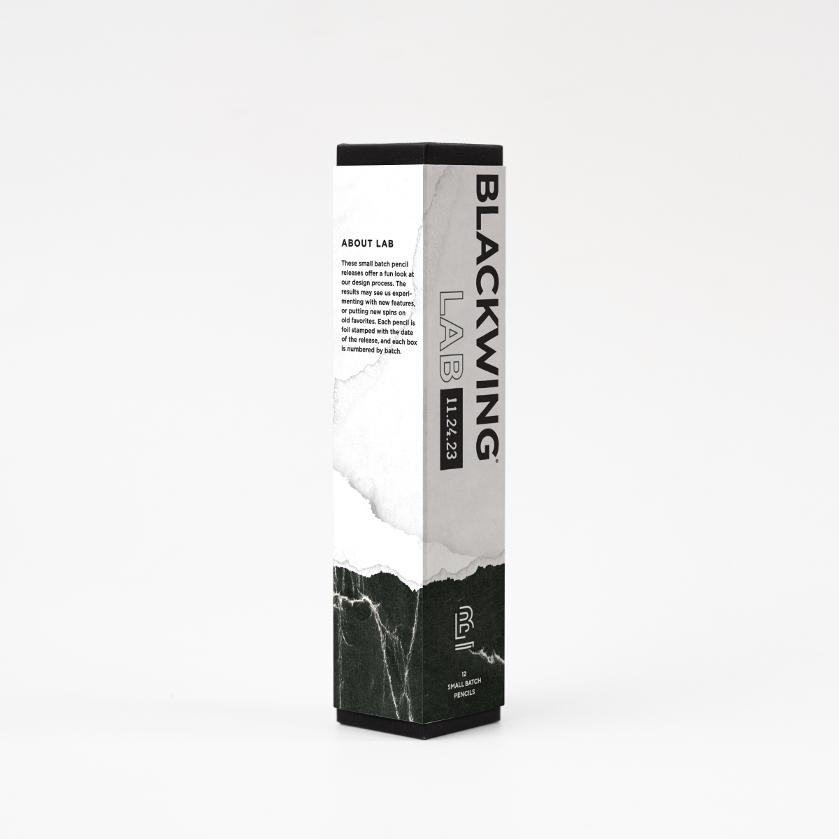 A Blackwing Lab 11.24.23 - Set of 12 pencil box with a black and white marble design.