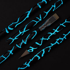  Blackwing Volume 2 pencil, black barrel with cracked blue design that glows in the dark