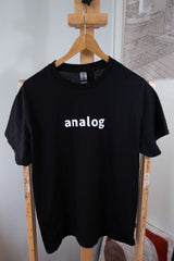 black cotton t-shirt with the word analog in white across the chest