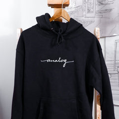 black hoodie with white "analog" cursive text 