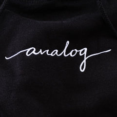 black hoodie with white "analog" cursive text 