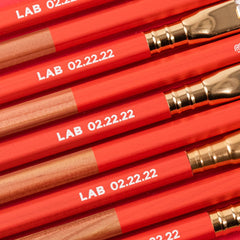 A row of Blackwing Lab 02.22.22 pencils